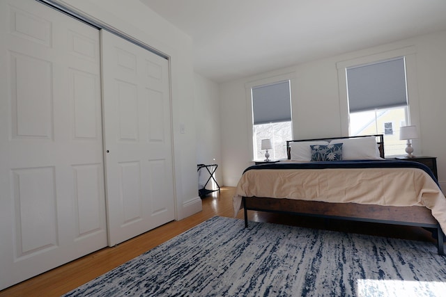 bedroom with wood finished floors