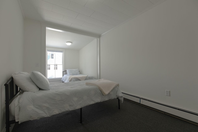 bedroom featuring carpet and a baseboard radiator