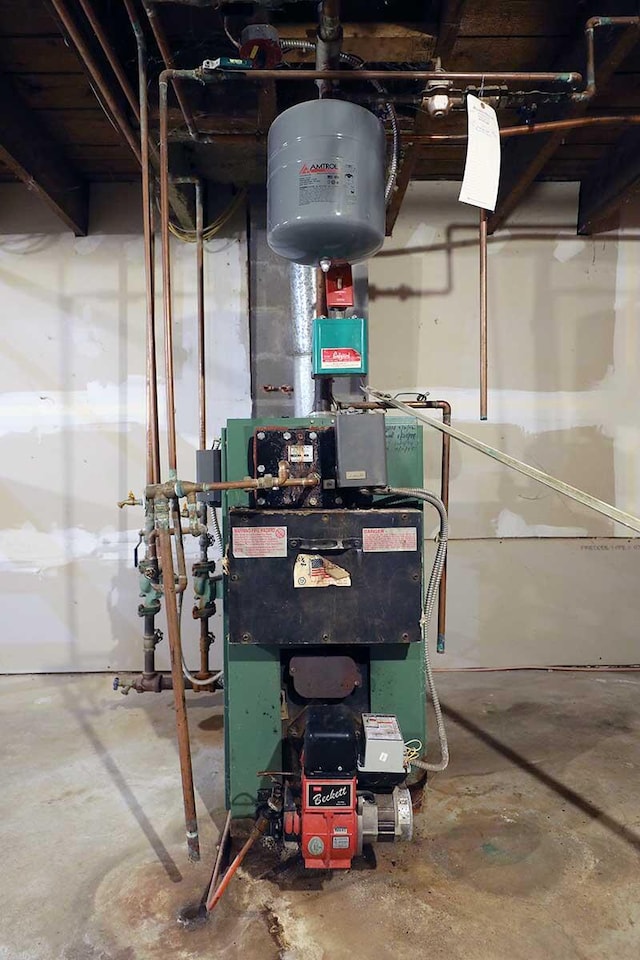 utility room featuring a heating unit