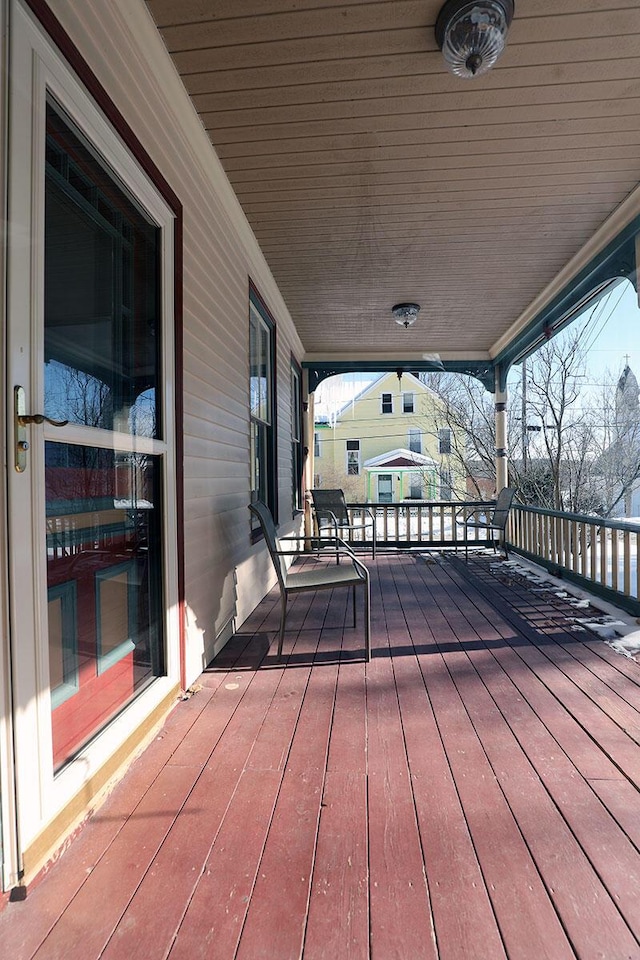 wooden terrace with covered porch