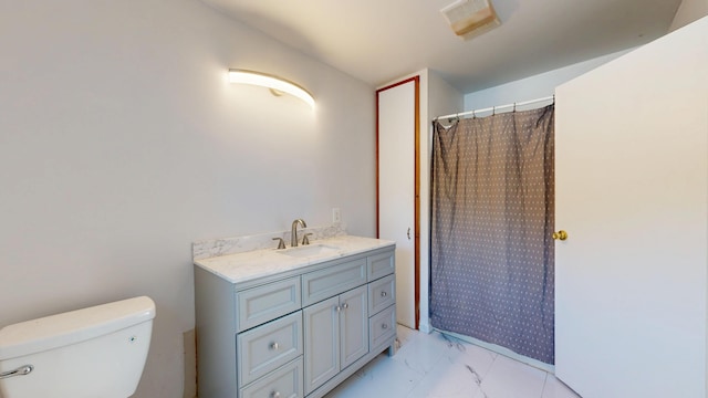 bathroom featuring visible vents, a shower with shower curtain, toilet, marble finish floor, and vanity