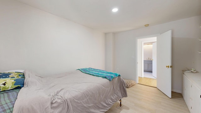 bedroom featuring light wood-type flooring