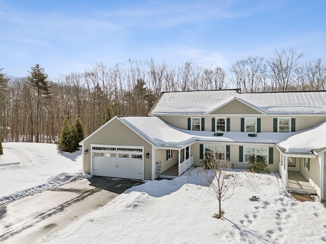 view of front of home featuring driveway and an attached garage