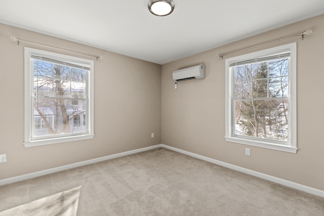 unfurnished room with light carpet, a wall mounted air conditioner, and baseboards