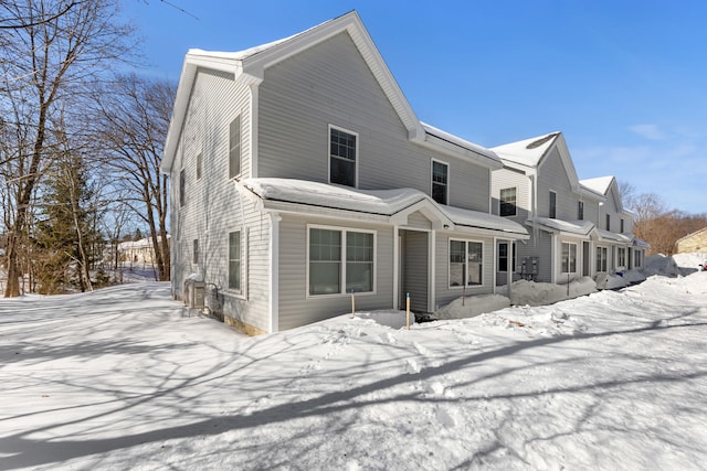 view of snow covered property