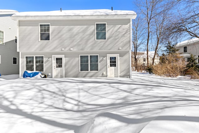 view of snow covered property