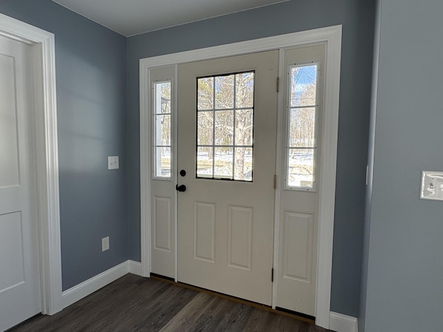 entryway with baseboards, dark wood-style flooring, and a wealth of natural light