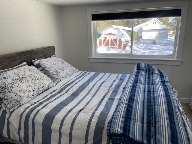 bedroom with multiple windows