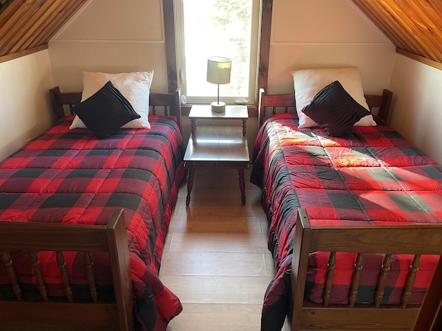 bedroom featuring wood finished floors