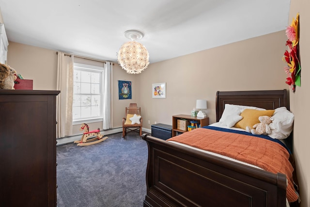 carpeted bedroom featuring baseboards, a chandelier, and baseboard heating