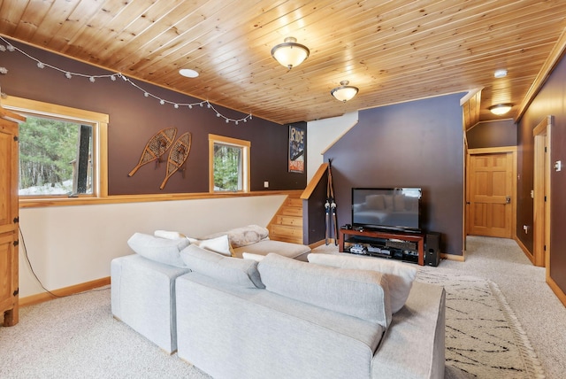 carpeted living room featuring wooden ceiling, plenty of natural light, and baseboards