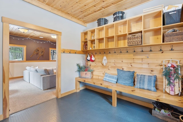 mudroom with wood ceiling and baseboards