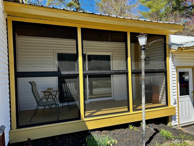 property entrance with metal roof