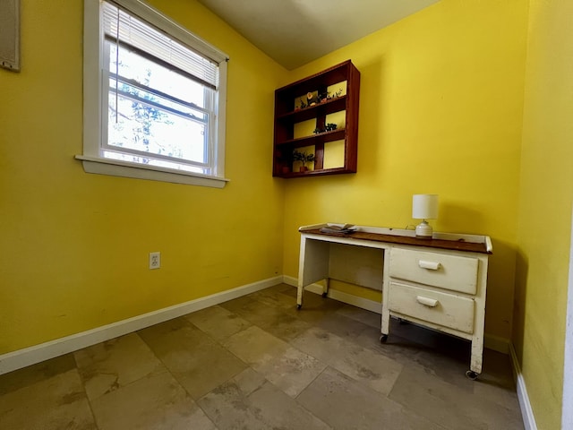 unfurnished office with baseboards