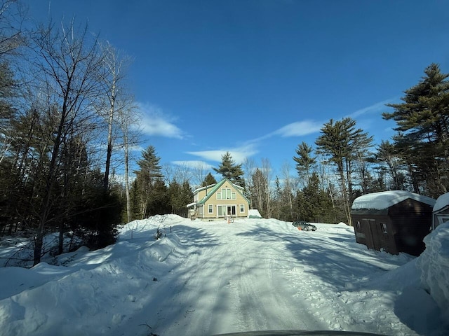 view of road with driveway