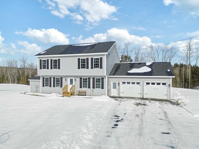 colonial home featuring an attached garage