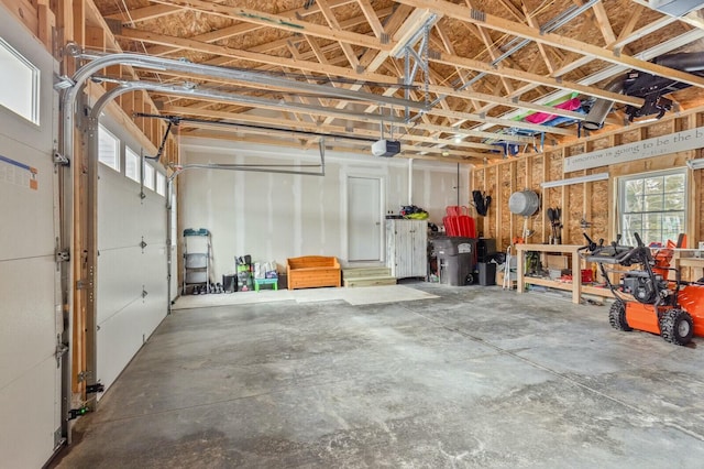 garage featuring a garage door opener