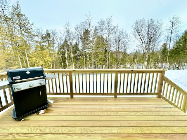 wooden deck featuring area for grilling