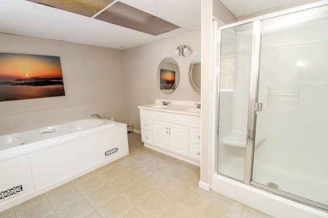 full bath featuring a stall shower, a sink, a bath, and double vanity