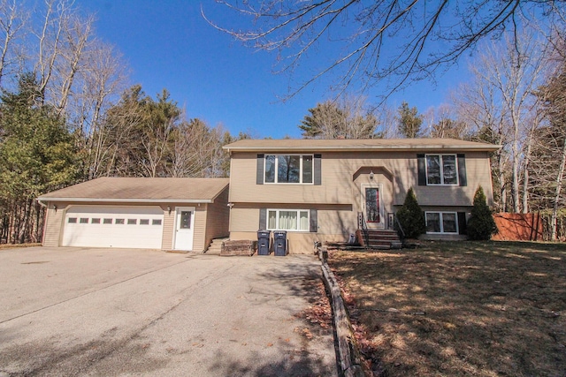 19 Shannon Dr, Bangor, ME 04401 - raised ranch with an attached garage, concrete driveway, and fence