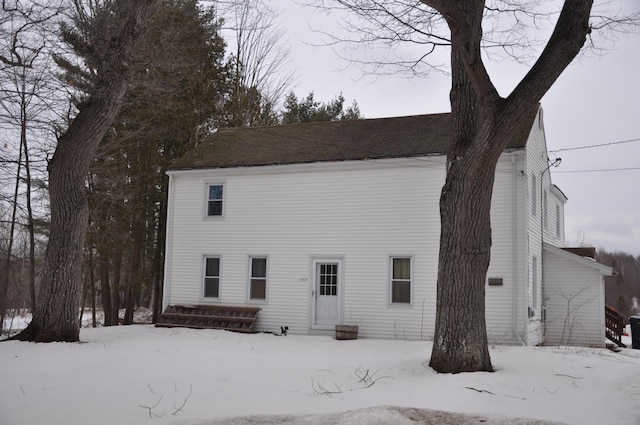 view of snow covered property