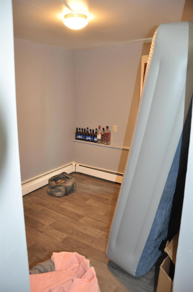 hallway featuring wood finished floors