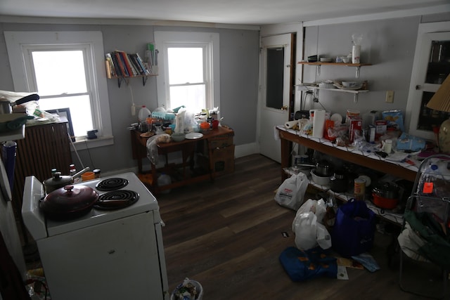 kitchen featuring dark wood-type flooring, white electric range, baseboards, and open shelves