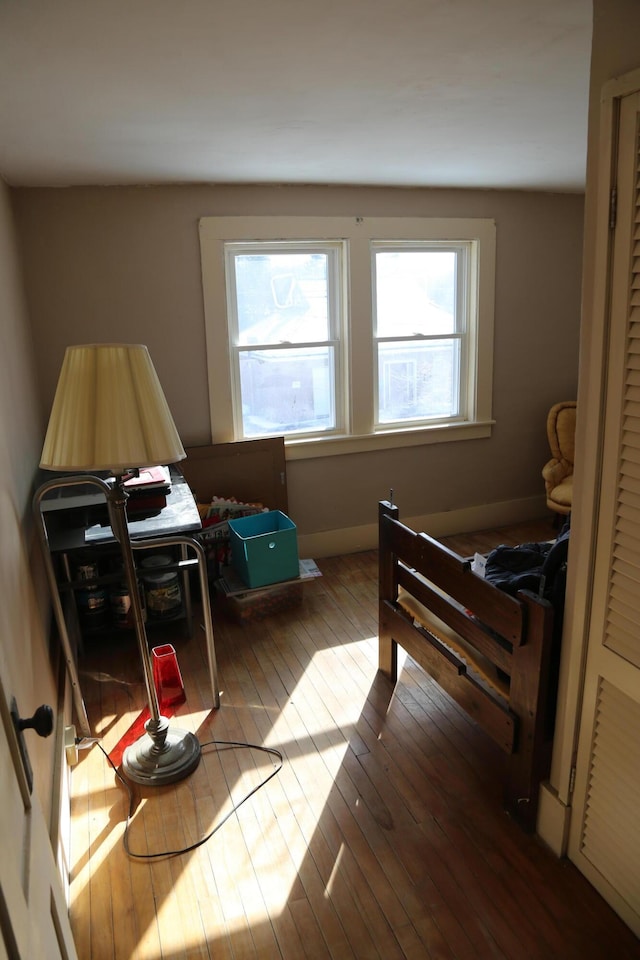 bedroom with wood finished floors