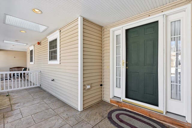 entrance to property with a porch