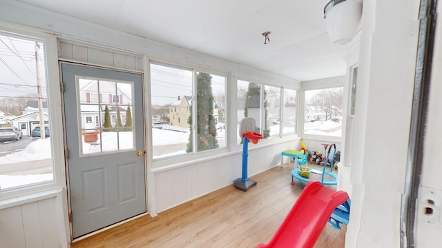 sunroom featuring a healthy amount of sunlight