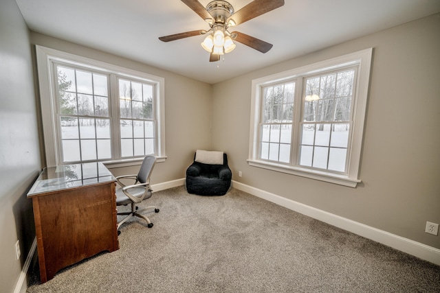 office with carpet floors, a ceiling fan, and baseboards