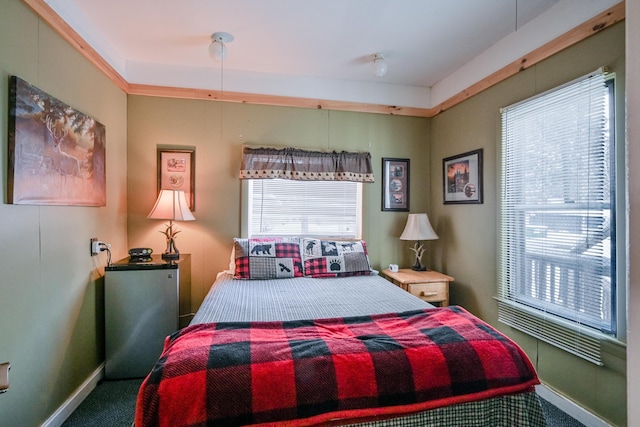 bedroom featuring baseboards