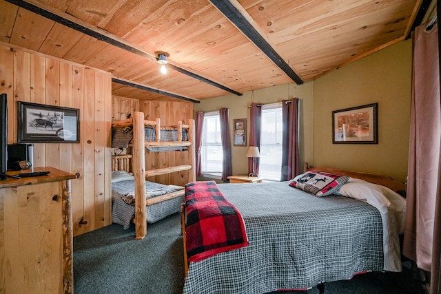 bedroom featuring wooden walls, wood ceiling, beam ceiling, and carpet flooring