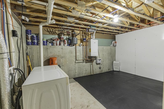 below grade area with washer / clothes dryer and tankless water heater