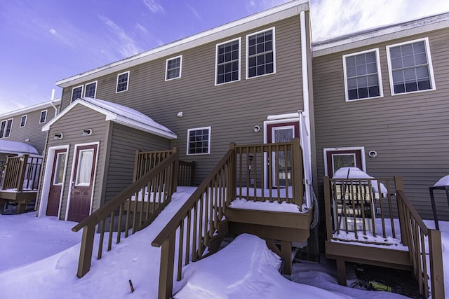 view of snow covered house