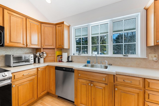 23 Sunny Acres Ln, Boothbay, ME 04537 - kitchen featuring appliances with stainless steel finishes, a sink, lofted ceiling, backsplash, and light countertops