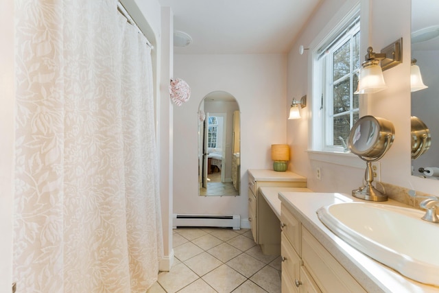 23 Sunny Acres Ln, Boothbay, ME 04537 - bathroom featuring baseboard heating, tile patterned floors, ensuite bathroom, and vanity