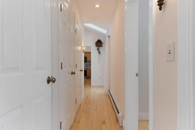 23 Sunny Acres Ln, Boothbay, ME 04537 - hall with a baseboard heating unit, light wood finished floors, recessed lighting, and baseboards