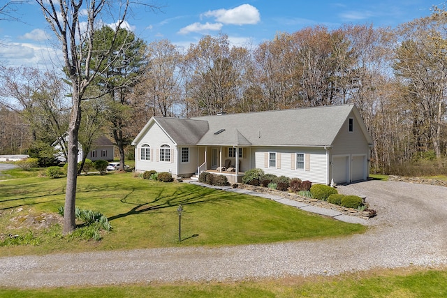 23 Sunny Acres Ln, Boothbay, ME 04537 - ranch-style home featuring a garage, a porch, driveway, and a front yard