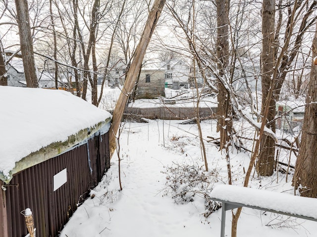 view of yard covered in snow