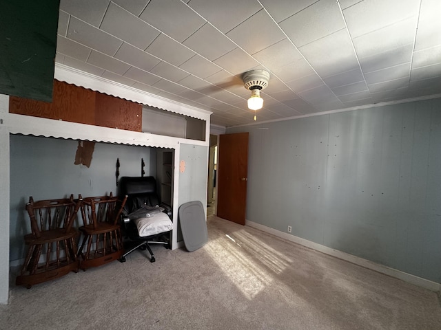 bedroom with carpet and baseboards