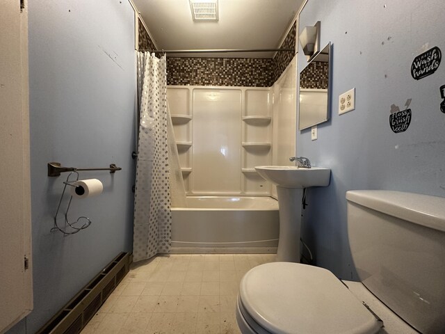 bathroom featuring toilet, shower / bath combo, visible vents, and tile patterned floors