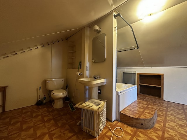 bathroom featuring toilet