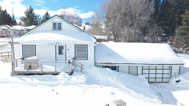 view of front facade featuring a chimney