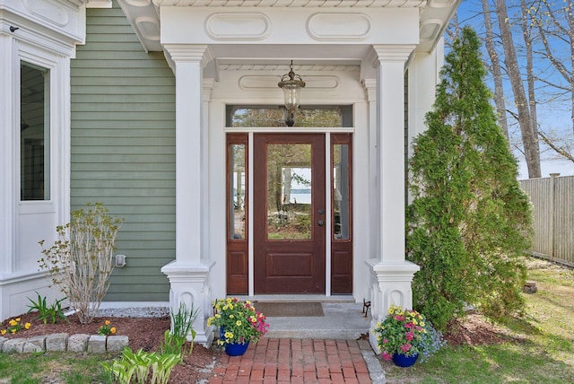 property entrance featuring fence