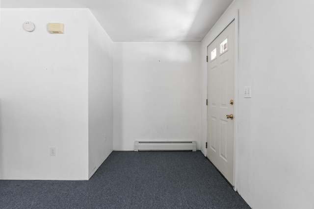 interior space featuring dark colored carpet and baseboard heating