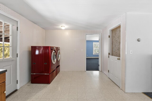 laundry area featuring wallpapered walls, washing machine and dryer, and laundry area