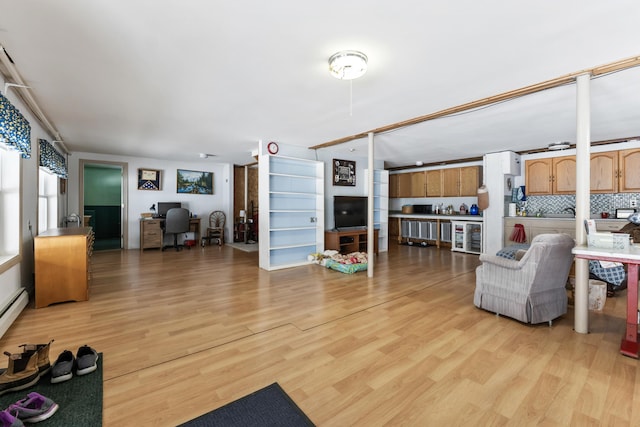 living area featuring light wood-style floors