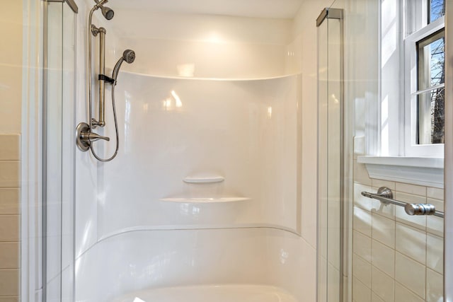 bathroom with a stall shower