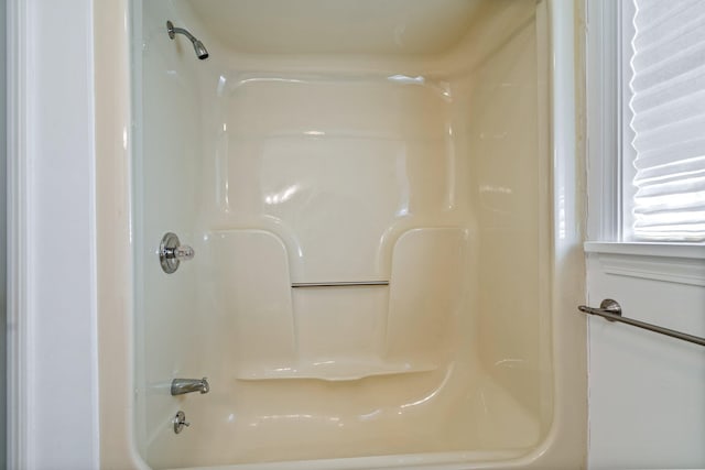 bathroom featuring a shower